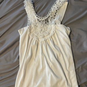 Super cute white tank top with lace straps